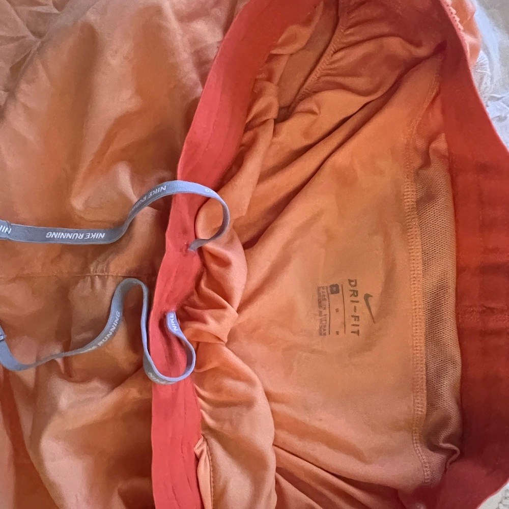 Orange nike shorts